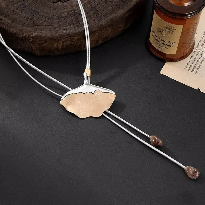 Silver and gold pendant necklace