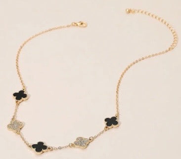 Black and gold clover necklace